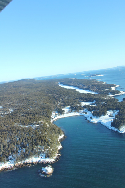 Head Harbor at the southern end of Isle au Haut with Long Pond , a revered wilderness lake in the distance.
