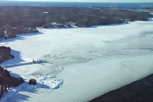 Traces of the ferry left in the ice approaching the Swans Island Terminal in Mackarel Cove