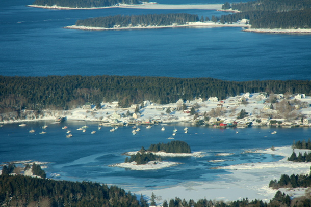 The fleet at Burnt Coat Harbor, Swans Island remains clear of ice.