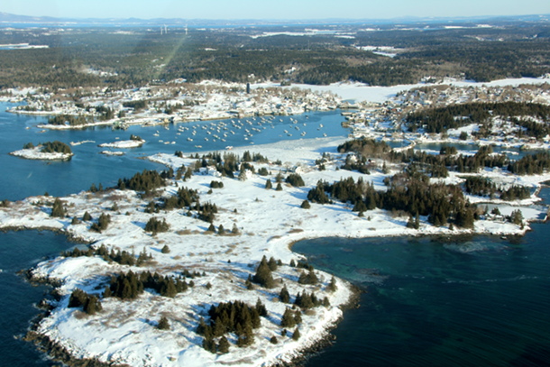 Lane Island and Carver's Harbor, Vinalhaven.  In the distance can be seen the three Fox Islands wind turbines.